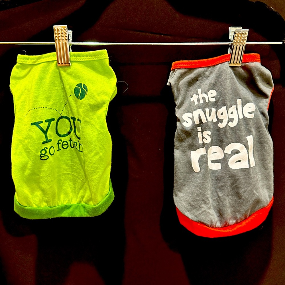Two doggie shirts. ‘The snuggle is real’ and ‘You go fetch’. Size small.
